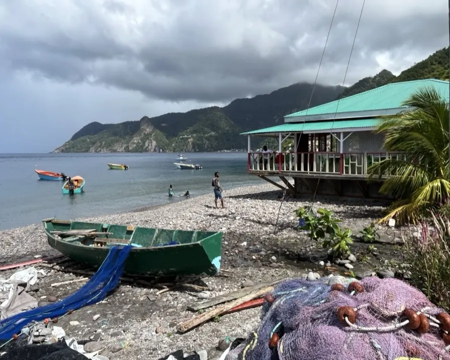 Fishing boats pulled up on a village beach