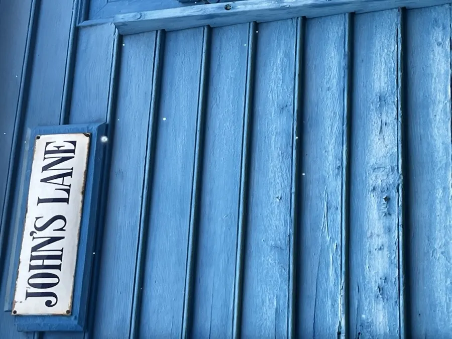 Weathered blue clapboard on John’s Lane