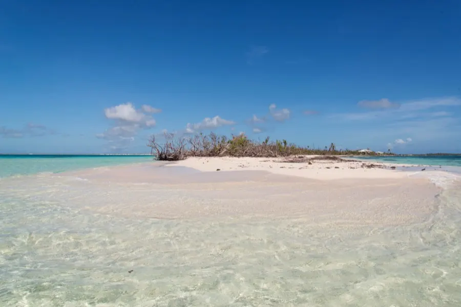 White sandbar in shallow turquoise water