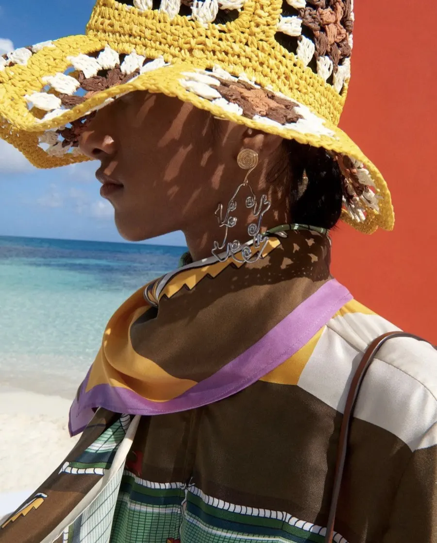 Model in a raffia hat