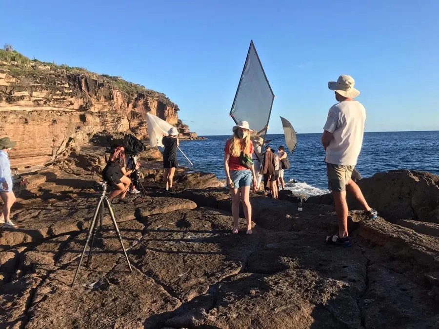 Behind the scenes: reflector and crew on the rocks